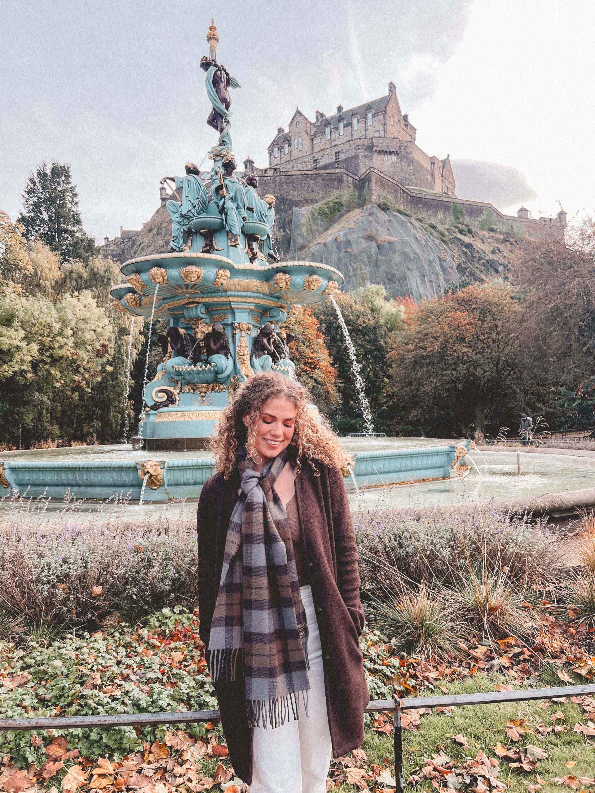 woman at Ross Fountain, in Edinburgh, Scotland